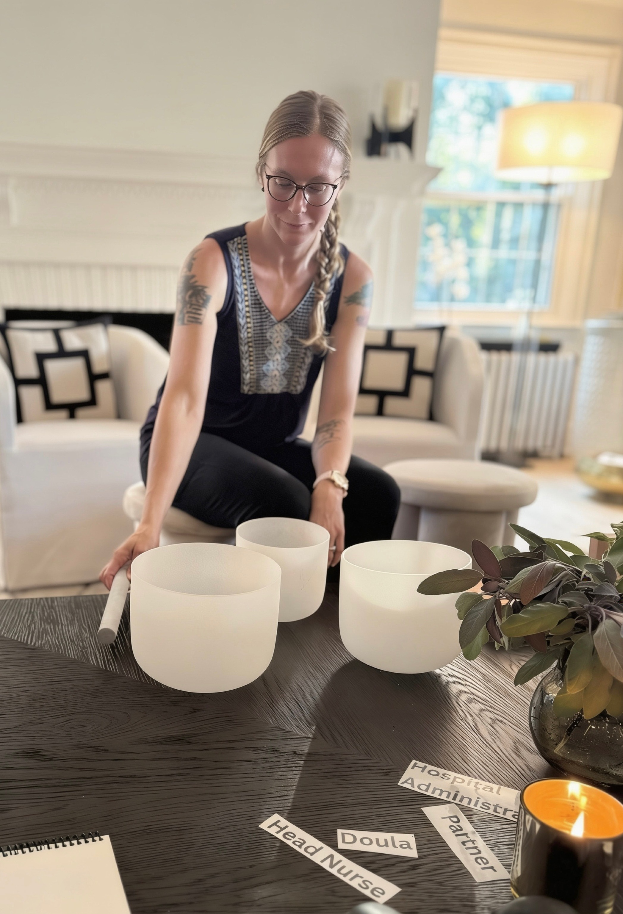 A woman bent over 3 bowls
