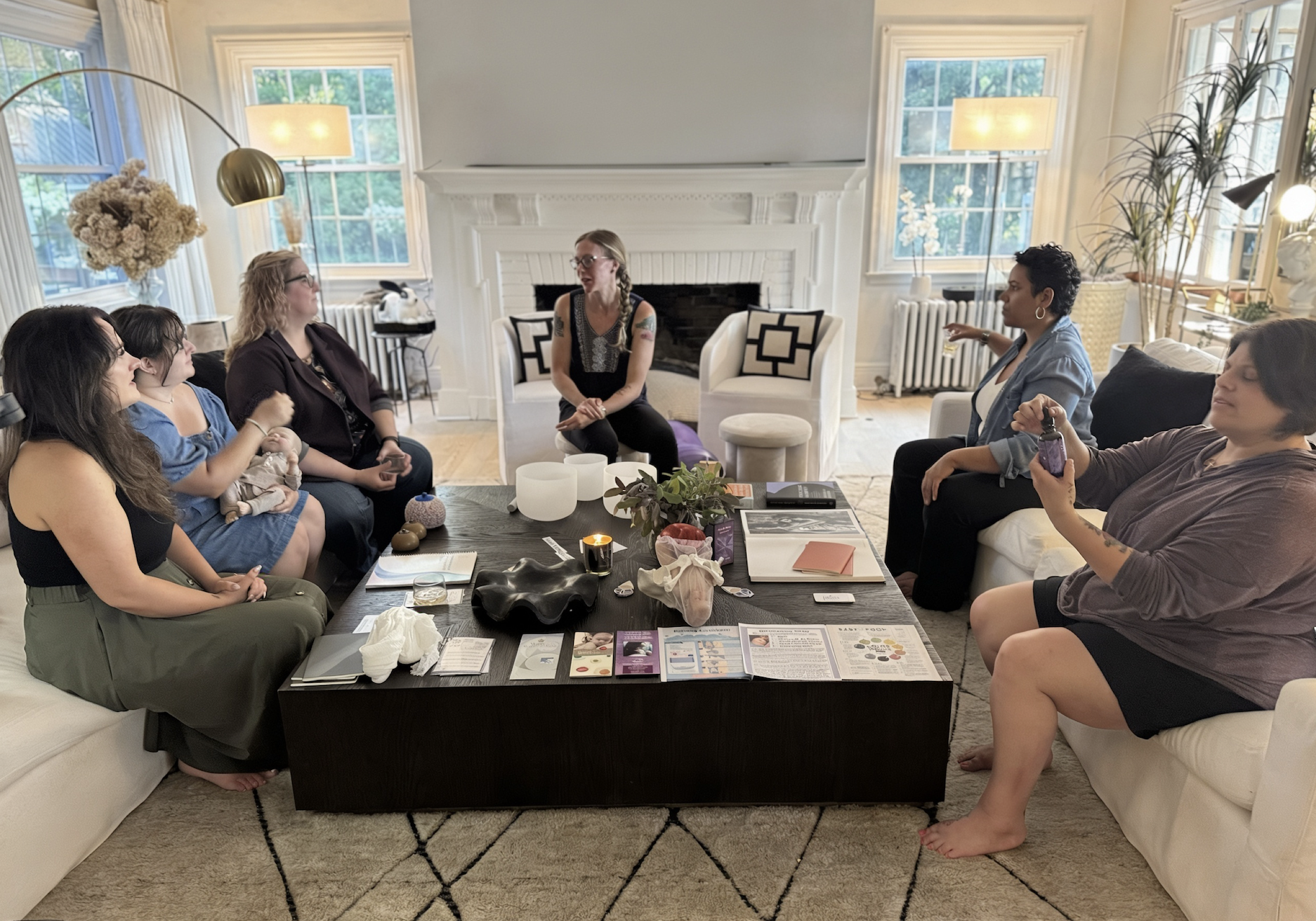 A group photo of a training around a table